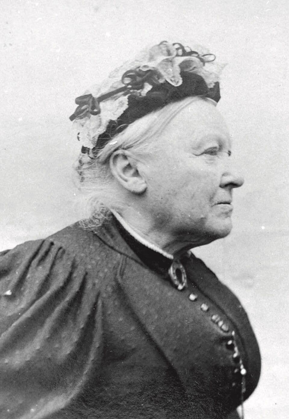 Image of Catherine Helen Spence in profile wearing a lace bonnet