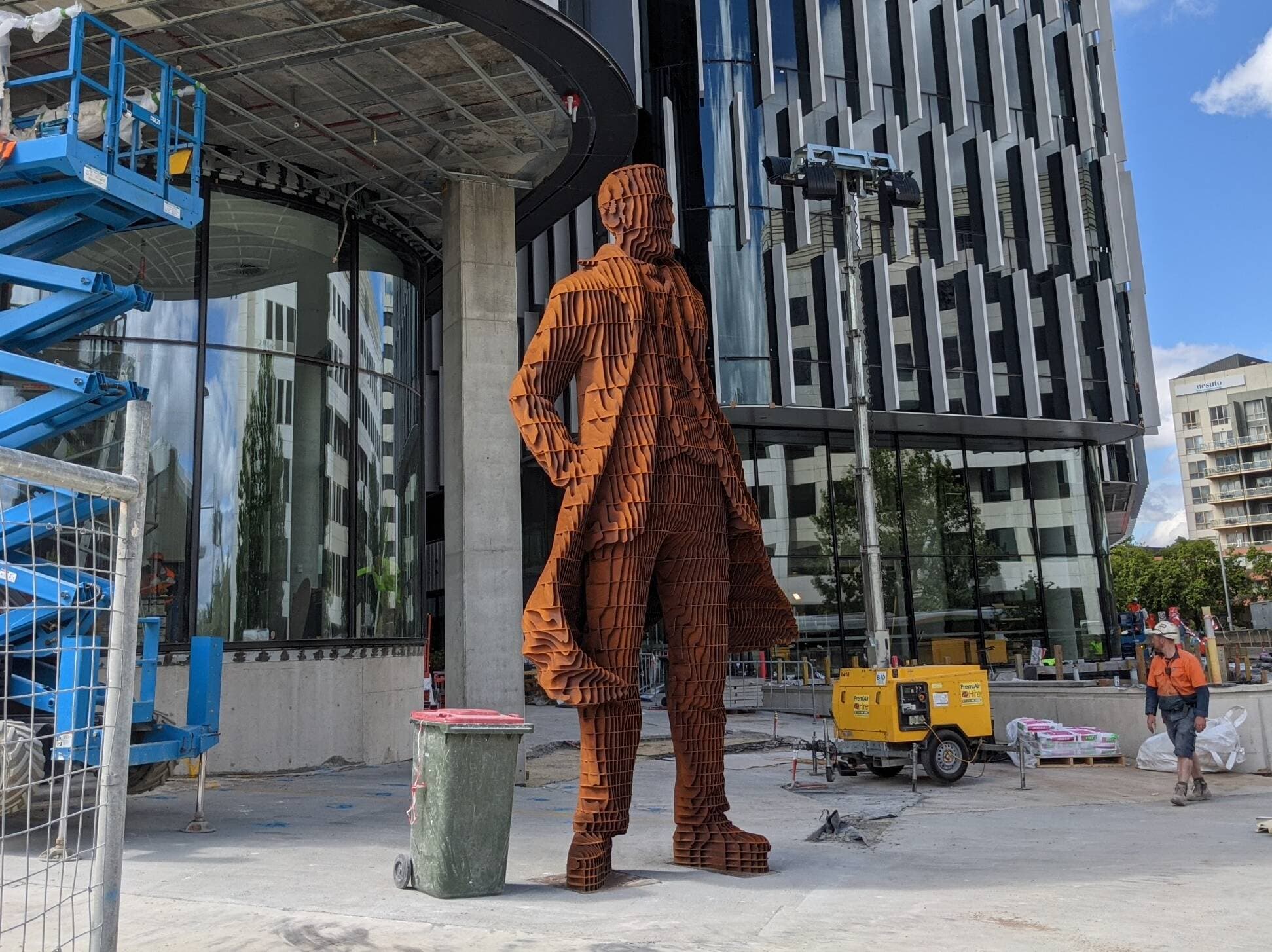 Image of Andrew Inglis Clark statue with construction work around him